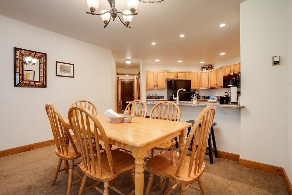 Gather around your spacious dining table for memorable meals together, with a fully-equipped kitchen ready for all your culinary adventures.