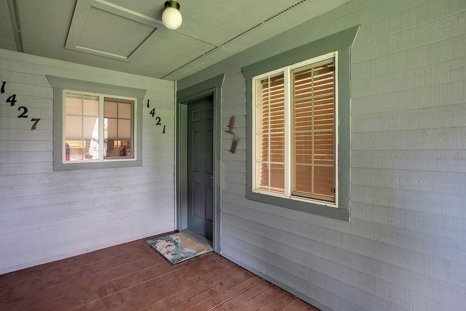 Charming covered entrance with classic architectural details welcomes guests to unit 1421.