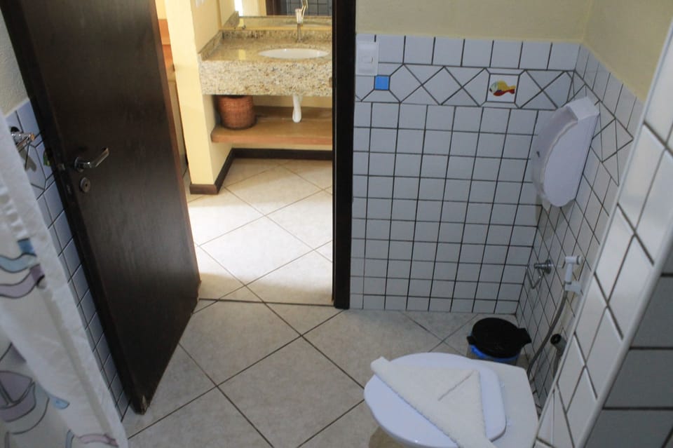 Deluxe Triple Room, Ocean View | Bathroom | Shower, free toiletries, hair dryer, towels