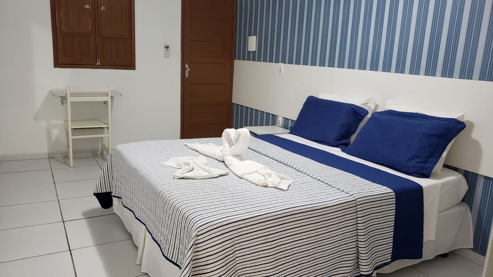 Standard Room | Minibar, in-room safe, individually decorated, desk