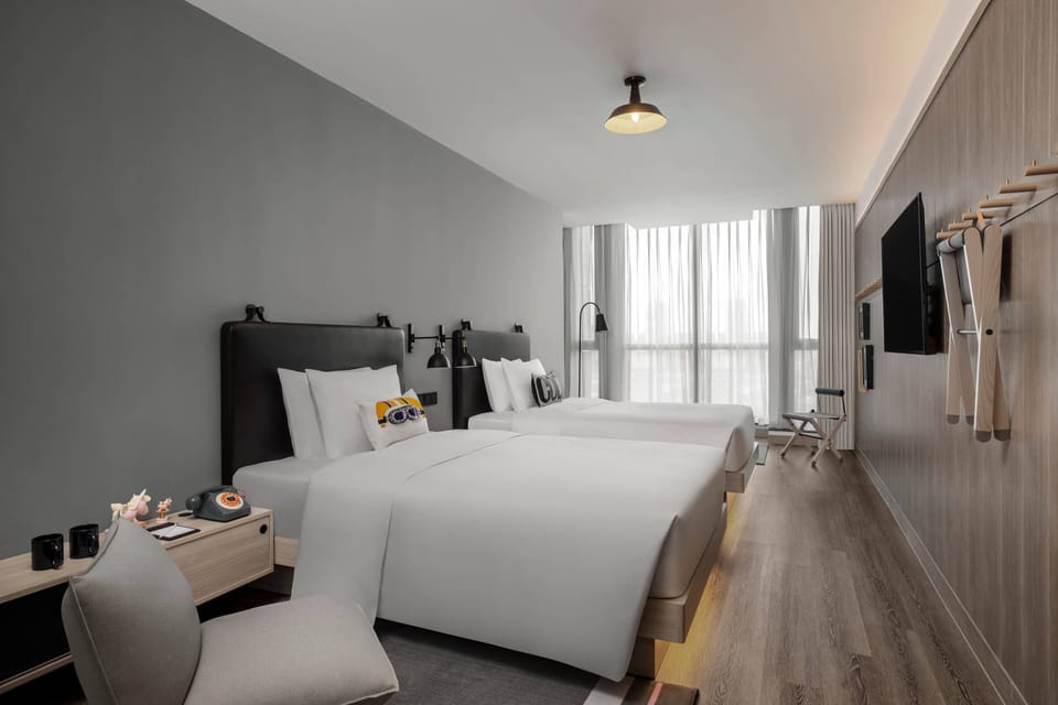 Moxie Double Room | Premium bedding, down comforters, in-room safe, individually furnished