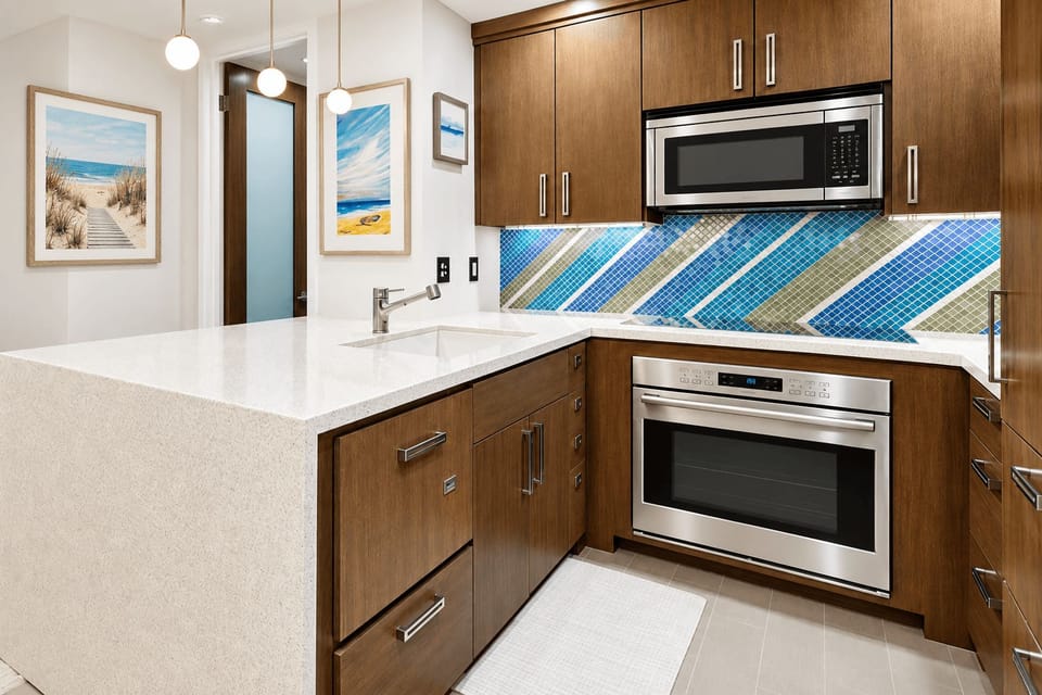 Fisher & Paykel dishwasher, Wolf oven, Sub-Zero refrigerator, and Keurig Coffee machine
