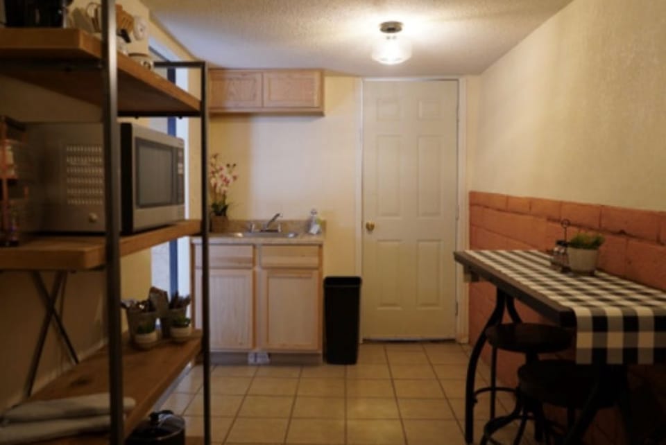 Sink and front door exit.
