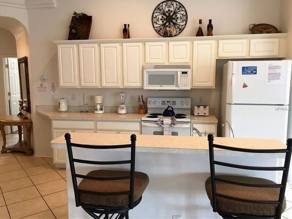 Villa, 4 Bedrooms | Private kitchen | Coffee/tea maker