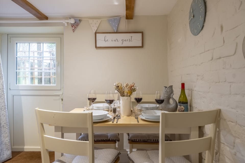 Ground floor: Kitchen with dining area and barn door