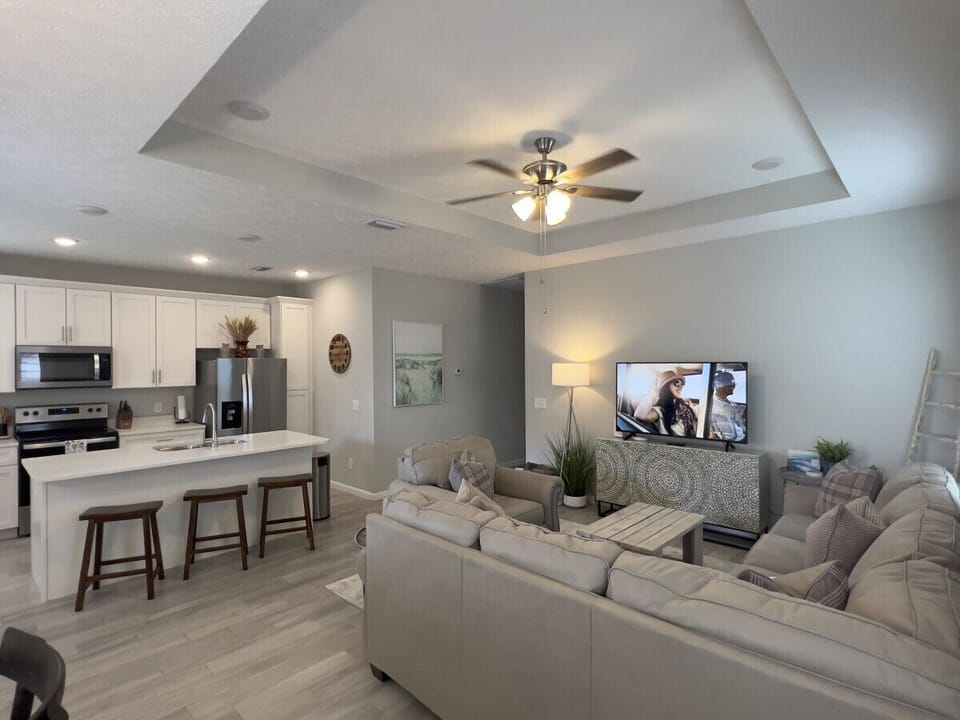 Living room, dining and kitchen area