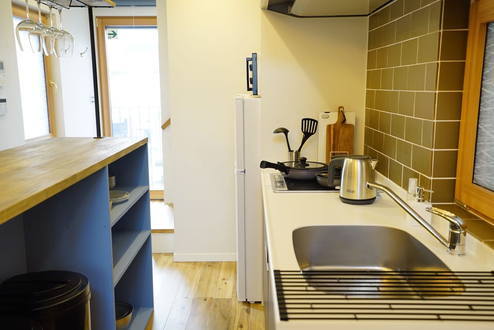 Family Suite, Non Smoking | Private kitchenette | Full-size fridge, microwave, stovetop, electric kettle
