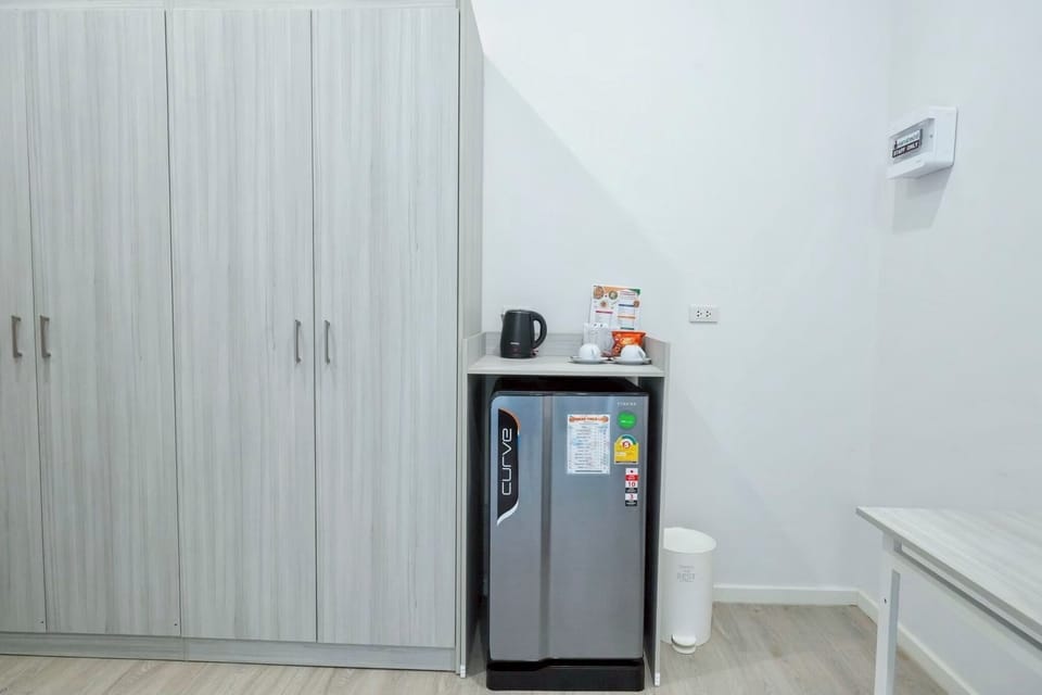 Junior Suite, 1 King Bed, Non Smoking, City View | Minibar, desk, laptop workspace, blackout drapes