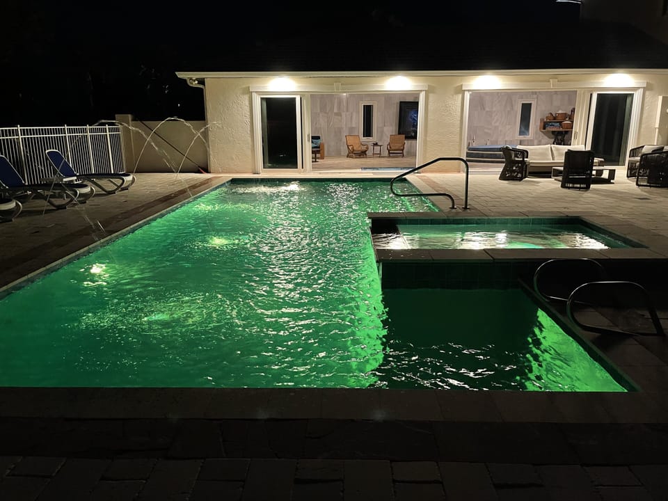Pool at night showing the Spa