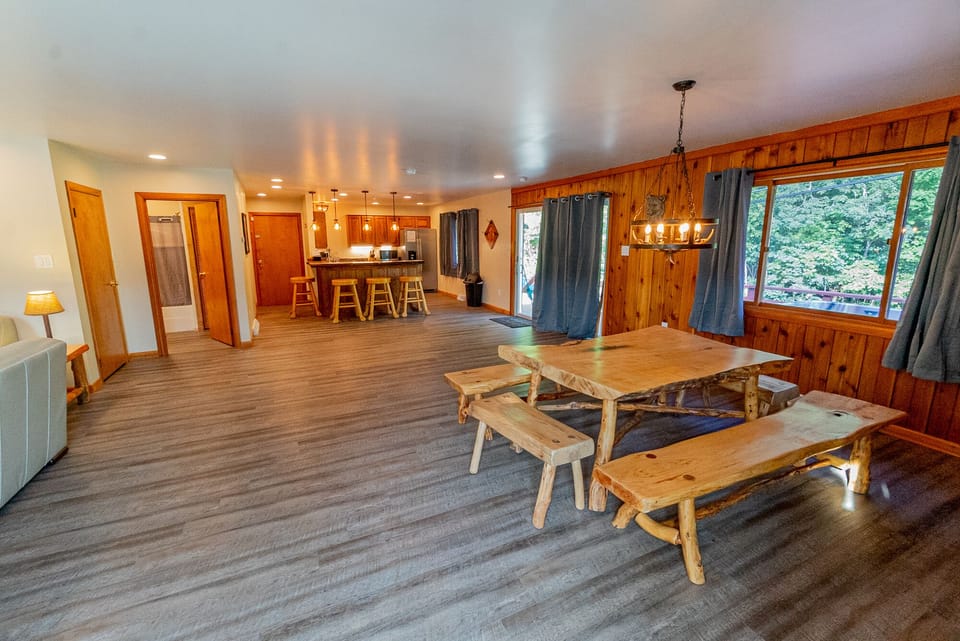 Dining Area - Main Level - Spacious dining area, with wooden table and bench