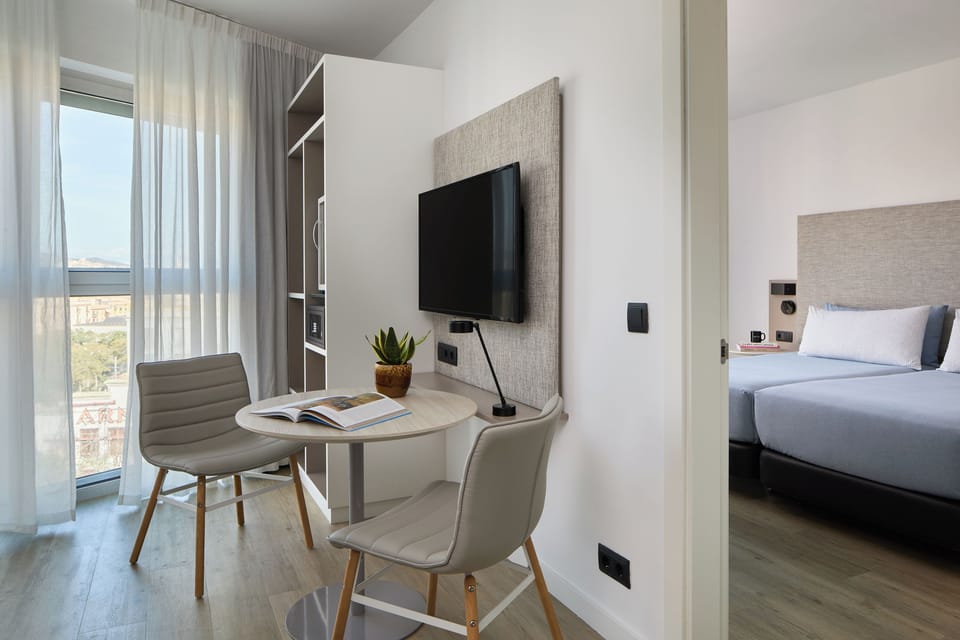 Premium bedding, down comforters, minibar, in-room safe