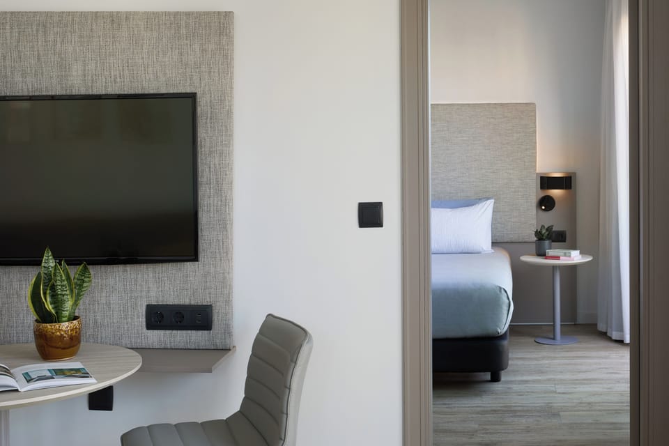 Premium bedding, down comforters, minibar, in-room safe
