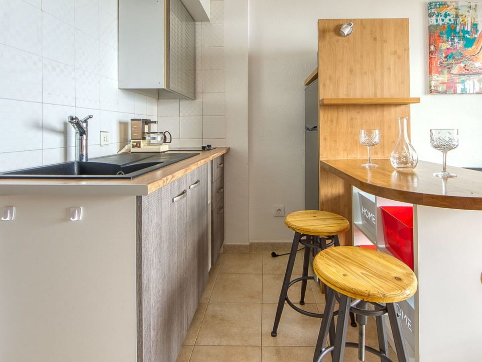 Cabinetry, Kitchen Sink, Furniture, Sink, Wood, Interior Design, Table, Countertop, Building, Kitchen