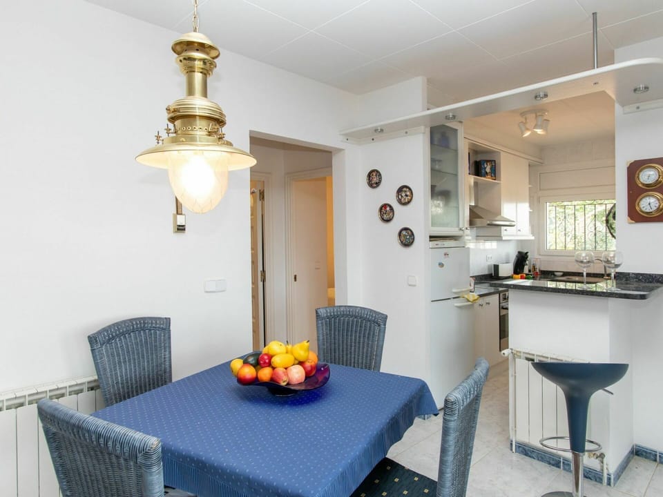 Table, Furniture, Property, Building, Chair, Cabinetry, Lighting, Interior Design, Plant, Orange