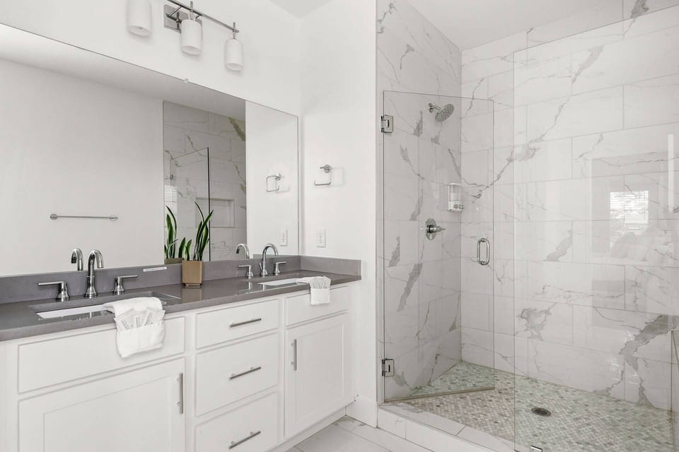 Get ready in style with spacious vanities and luxe lighting