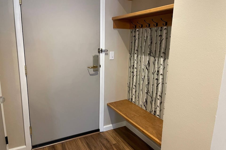 Coat and bag storage at entrance