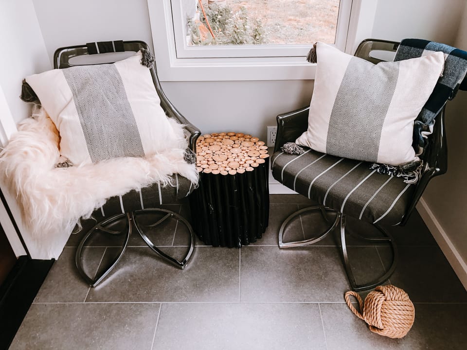 Little enclosed front porch, perfect for a cup of tea on a rainy day.