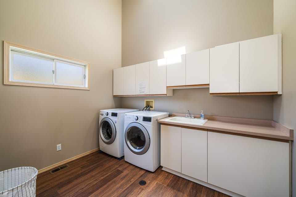 Upper level laundry room (includes laundry detergent & fab softener)