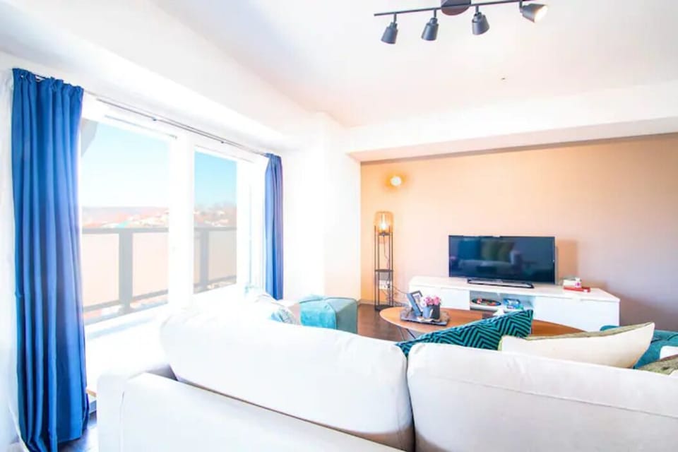 Apartment, Non Smoking | Living area | Flat-screen TV
