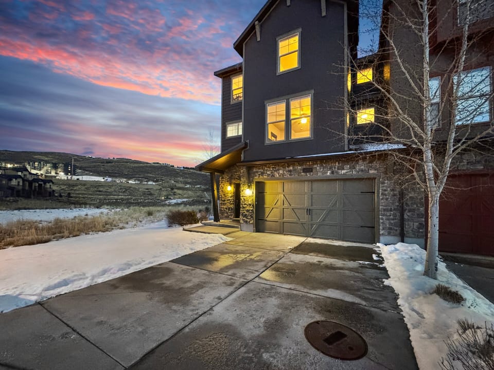 Mountain Gypsy is at the end of a row of townhouses, which means shared walls on only one side. The home also features a two-car garage with additional parking for two vehicles in the driveway.