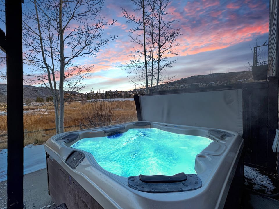 The private hot tub can fit up to 8 guests and is situated next to...