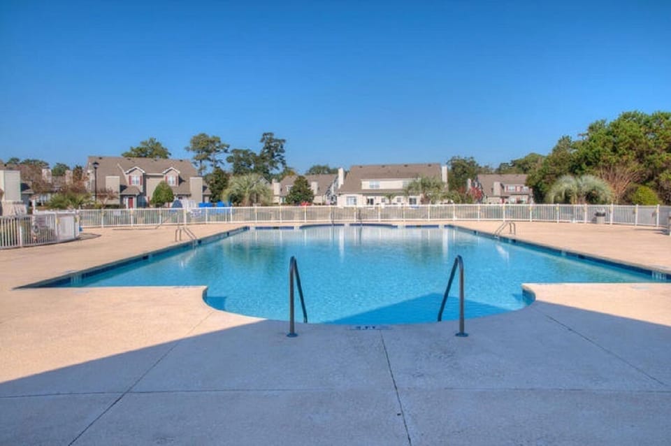 Soak up the rays while the kids splash around in this sparkling pool.