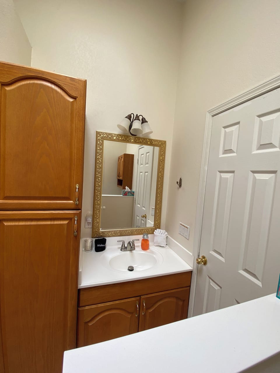 This bathroom is located on main floor near kitchen for western themed room.