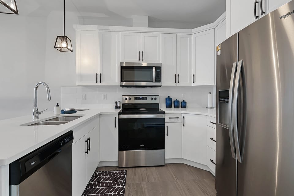 Fully equipped kitchen with settings for eight people