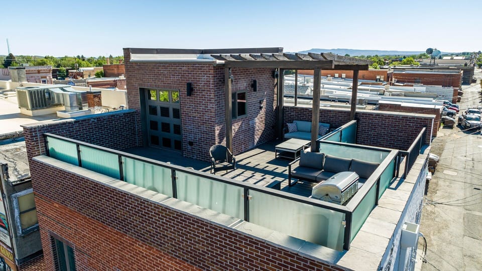 Rooftop deck with views of downtown is a perfect space to relax after a day of exploring Cody or Yellowstone