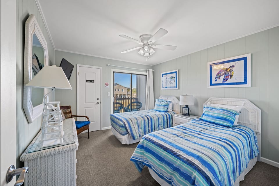 Spacious bedrooms provide room for you and the kids. Check out the balcony!