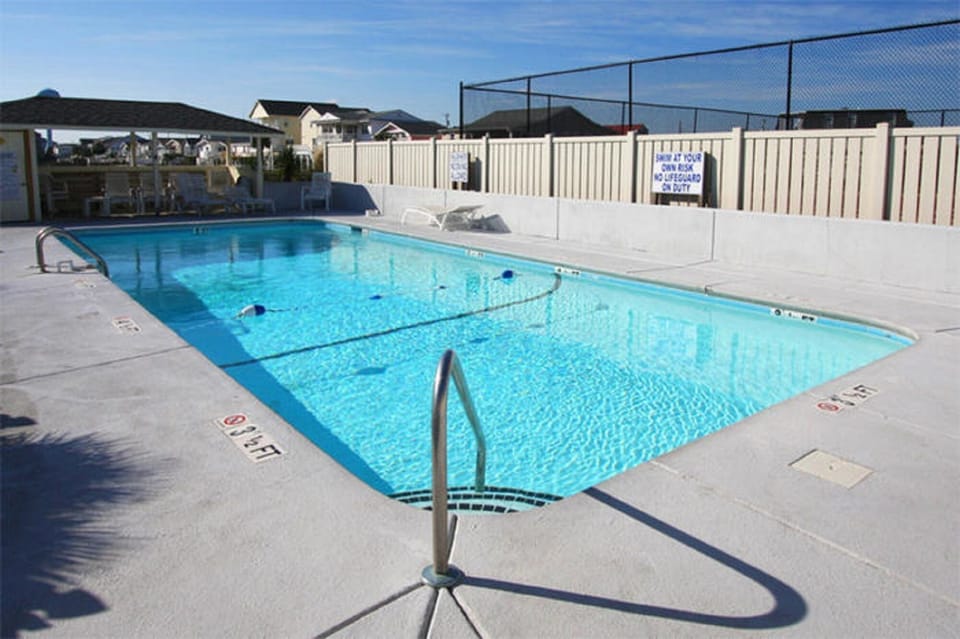 Take a cool dip in the pool after a fun day at the beach.