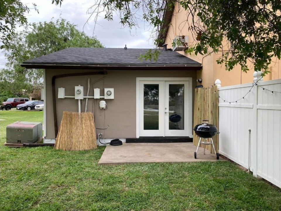 The backyard is ready for a family gathering and a BBQ