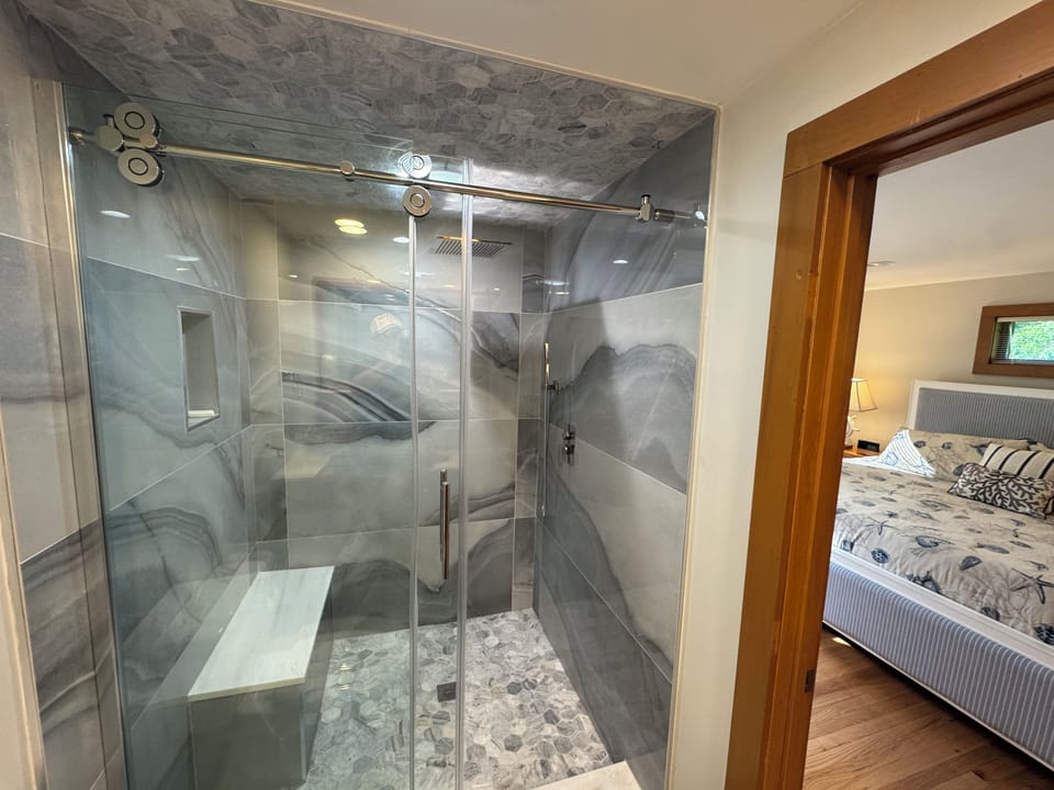 Beautiful new walk-in shower (2024) for master bedroom bathroom!