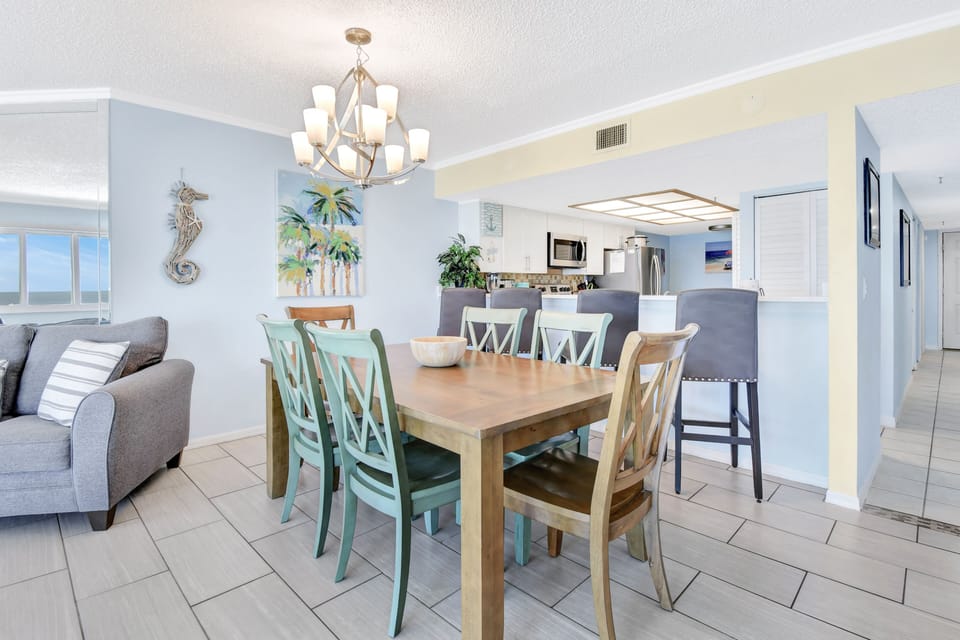 3BR dining table seats 6, 4 hightop chairs and another table for 4 in kitchen.