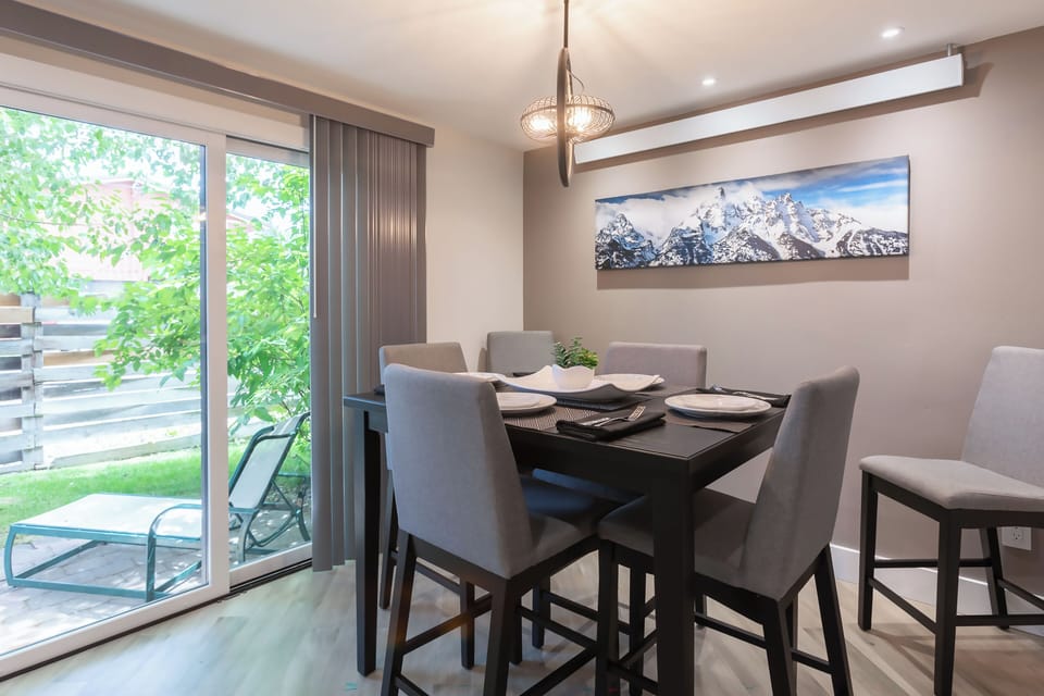 Bright dining room with enough seating for six people, or lounge on the patio.