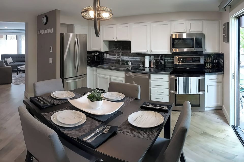 Modern Kitchen - Dining Combo with well stocked cabinets and sunny patio view.