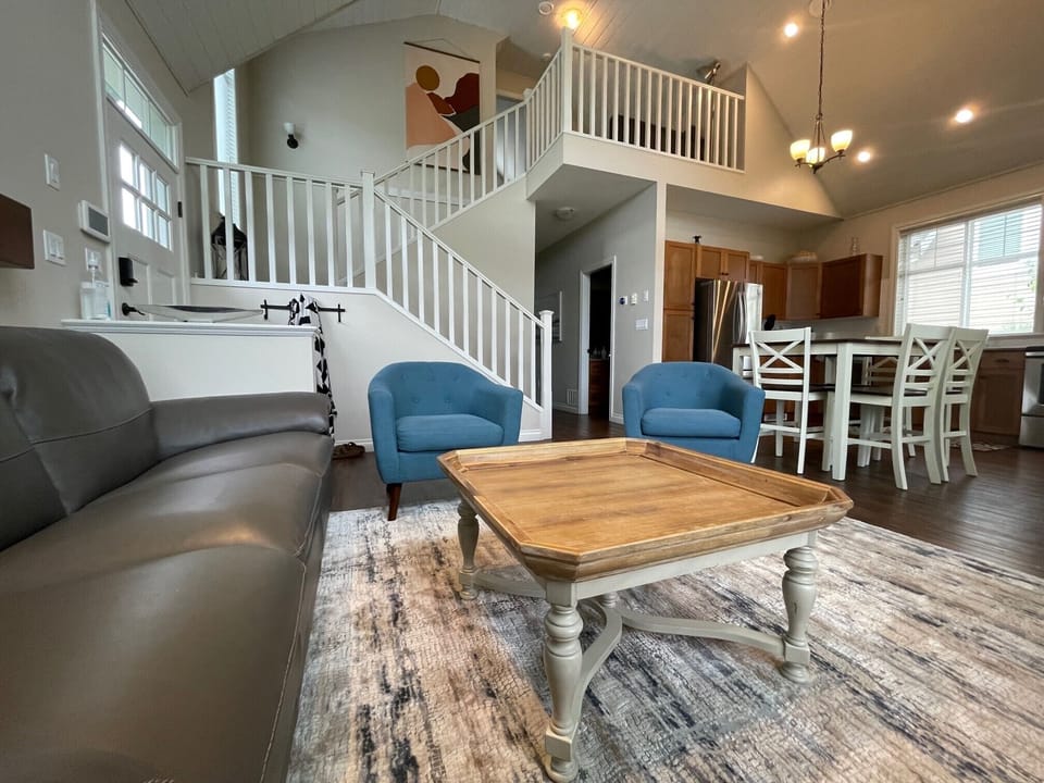 Open living area with loft