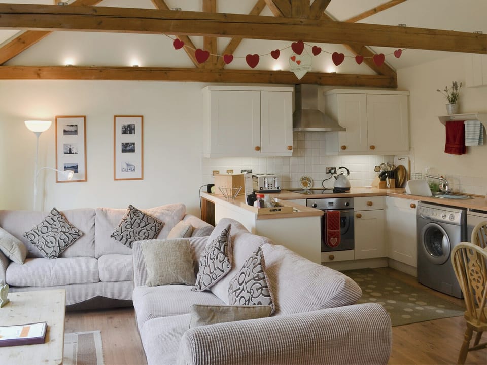 Open plan living space | Sunflower Holiday Cottage, Thoresthorpe, near Alford