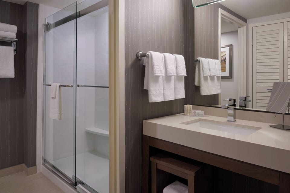 Room, 1 King Bed with Sofa bed | Bathroom | Hair dryer, towels