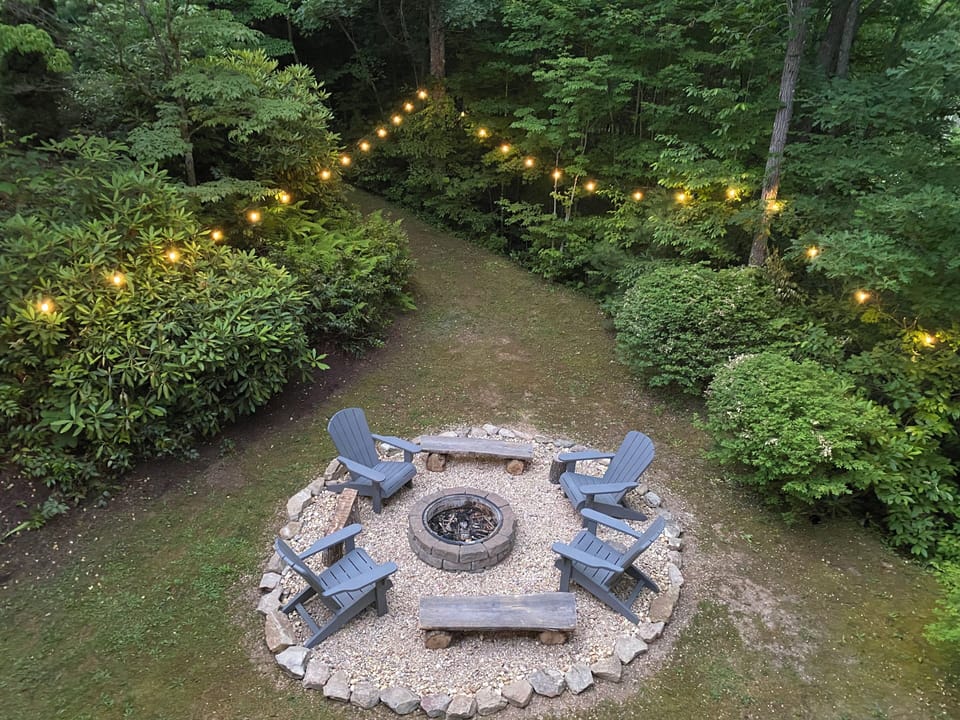 Gather around the fire pit under string lights and stars!