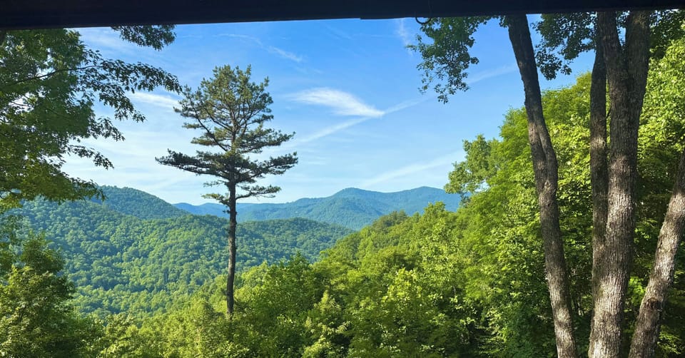 Relax on the covered wraparound deck & soak in the breathtaking mountain views!