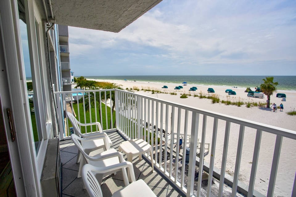 Two side-by-side Beachfront Balconies with a Perfect View of the Evening Sunset over the Gulf