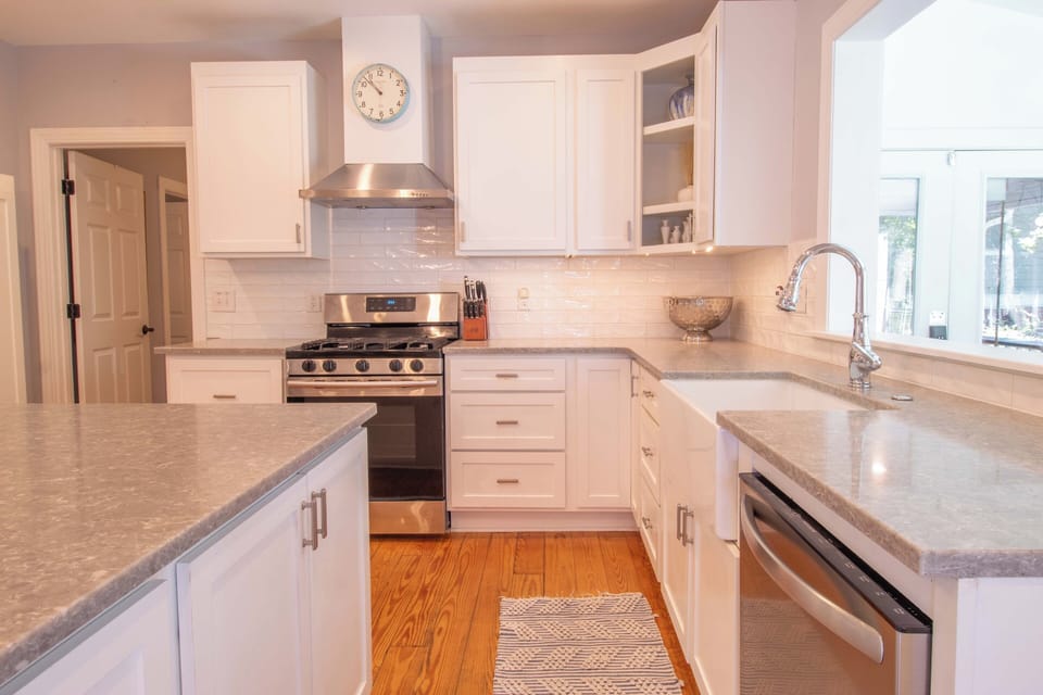 Bright, modern kitchen with sleek appliances and ample counter space—perfect for preparing your favorite meals during your stay.