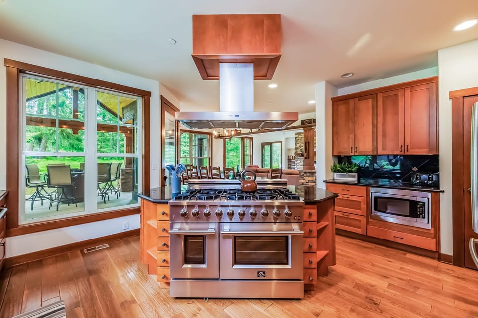 Perfectly custom built kitchen area with 48" Thermador Gas Range