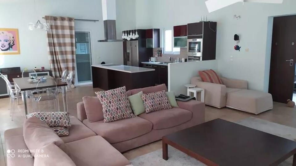 Villa | Living room | 30-inch TV with digital channels, fireplace