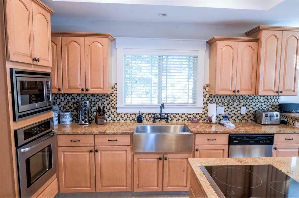 Fully stocked kitchen with huge center island. Laundry room is off the kitchen.
