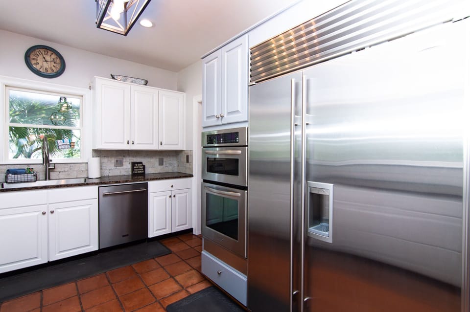 Subzero fridge with built-in water and ice maker.