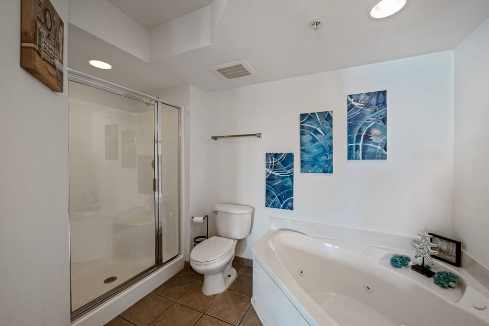 A spacious bathroom is just the place to wash away the sand.