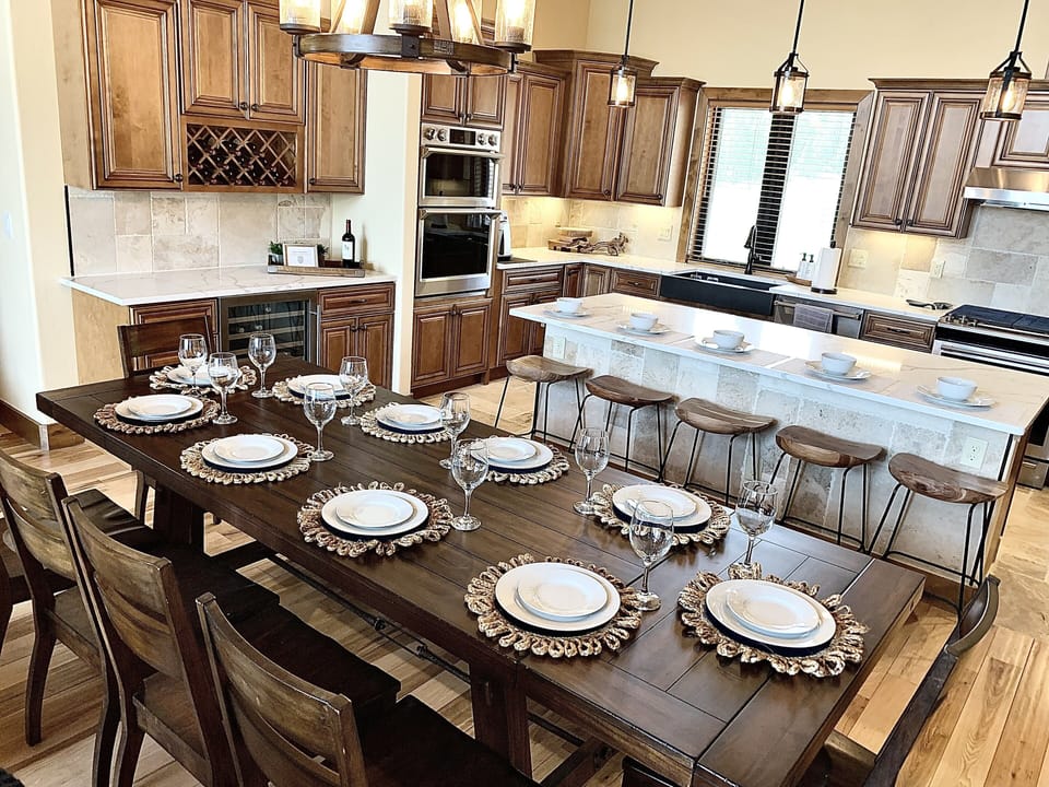 Extendable dining table that seats 10 and kitchen island that seats 5. 