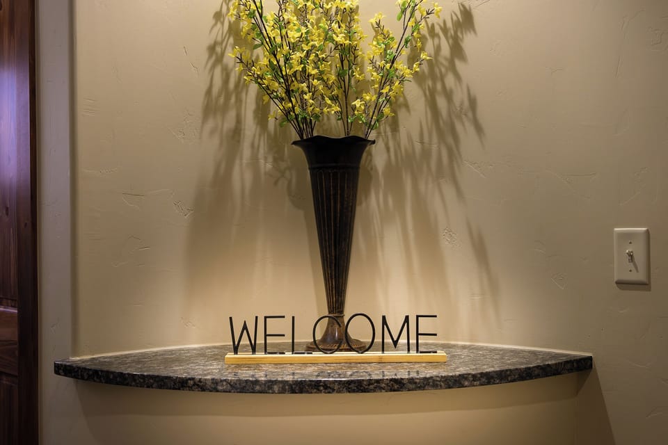 "WELCOME” sign to our humble abode.